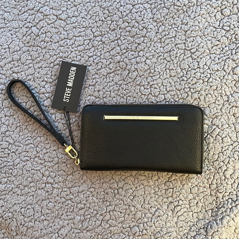 NWT. Steve Madden black wallet/wristlet w/ gold accents.